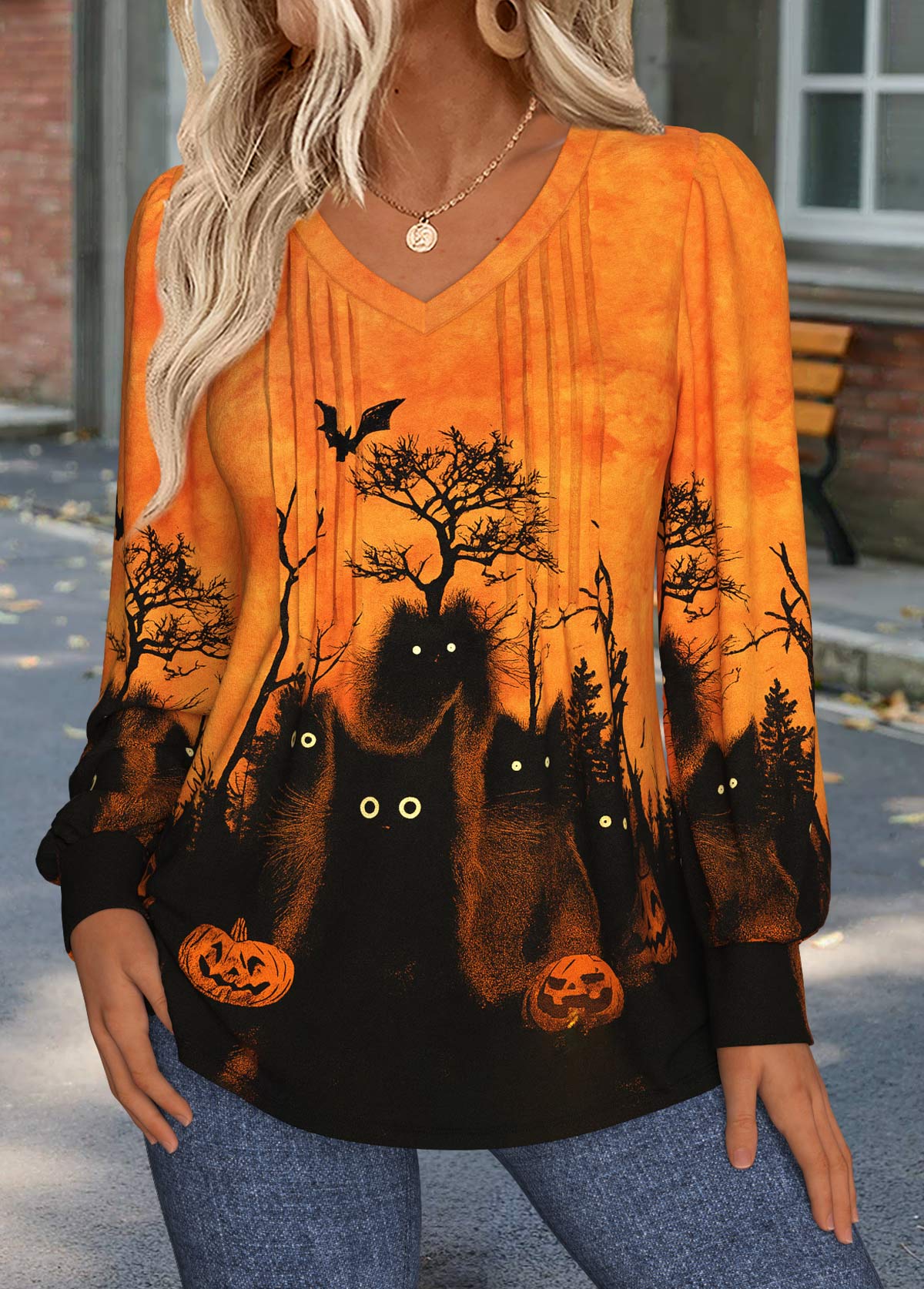 Pomarańczowa koszulka z długim rękawem na Halloween z widocznymi szwami