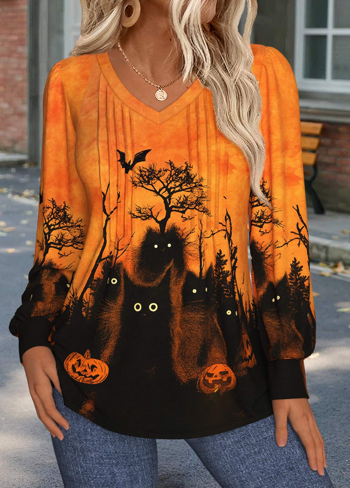 Pomarańczowa koszulka z długim rękawem na Halloween z widocznymi szwami